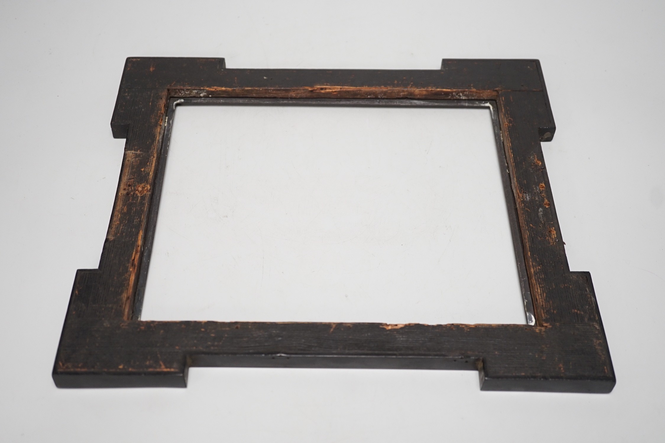 A 19th century red tortoiseshell and metal mounted picture frame. 27 x 31cm